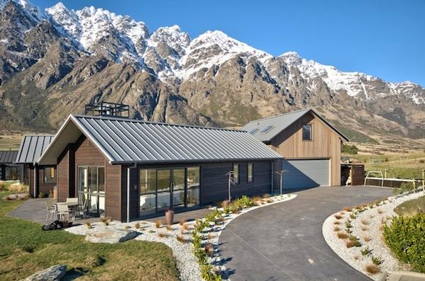 Exterior view of the gold medal-winning Builders Own Home in Queenstown with The Remarkables mountain range as a backdrop.  